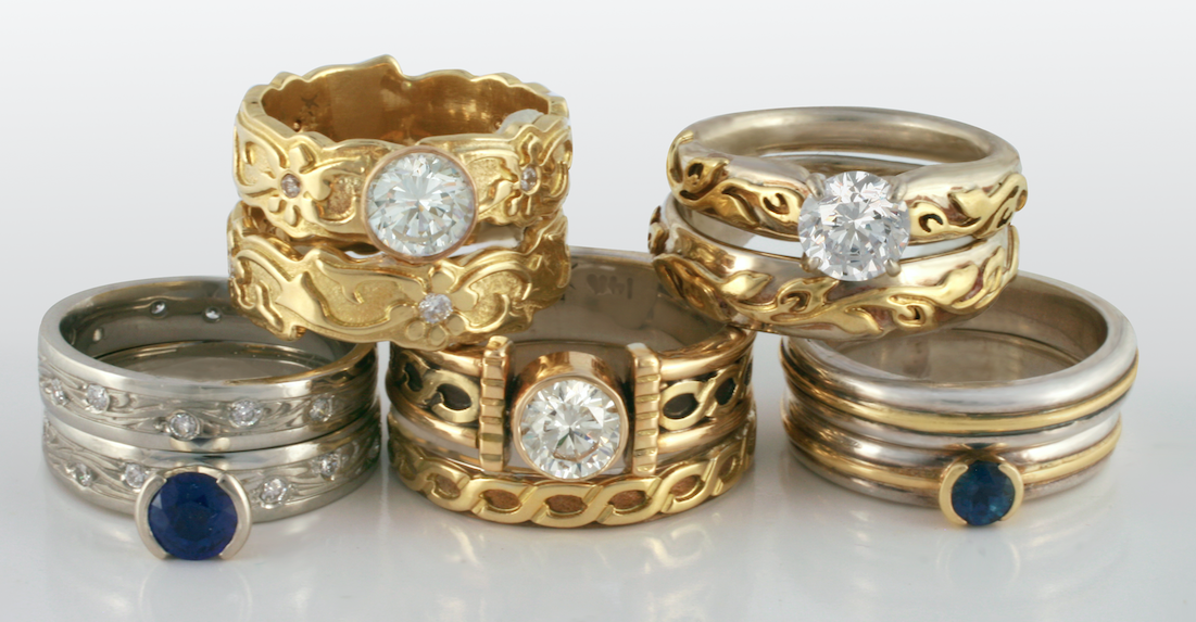 These bridal ring sets feature a gold wedding band paired with a matching sapphire or diamond engagement ring.